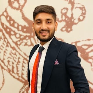 Suyash J.