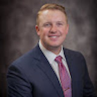 Nicholas K.